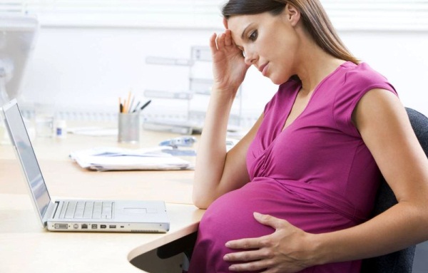 У беременной болит голова