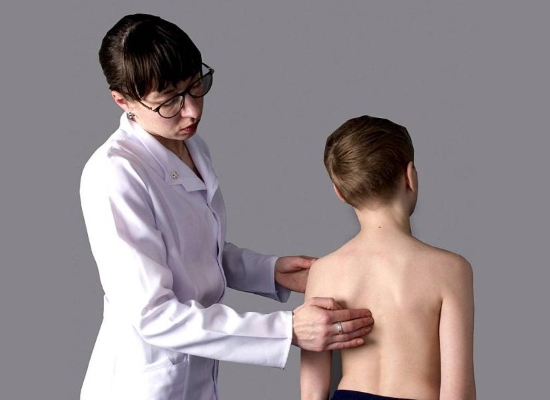 Возникновение боли в спине у ребенка